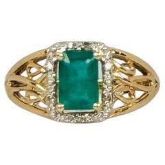 14K Yellow Gold Ring with Faceted Emerald and 8 Round Brilliant-Cut Diamonds