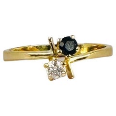 Oro giallo 18 carati con zaffiro blu 0,06 carati e diamante taglio brillante 0,06 carati