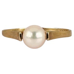 Anello solitario rotondo con perla in oro giallo 9 carati, 1990 circa