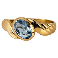 Anello ovale in oro giallo 14 carati con acquamarina, 1980 circa