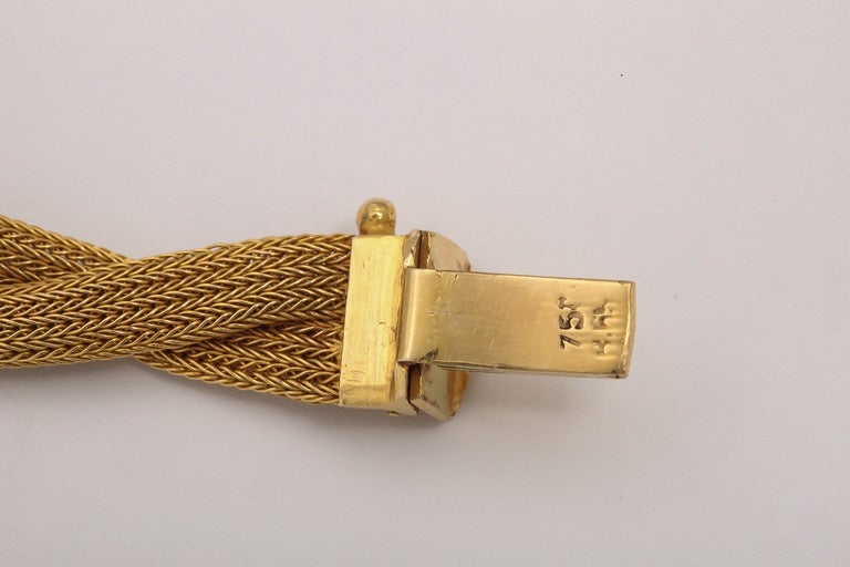 Beautiful 18kt Yellow Gold woven chain inspired by classical Antiquity.  Ca 1960.                             750 gold mark & unknown maker's mark.