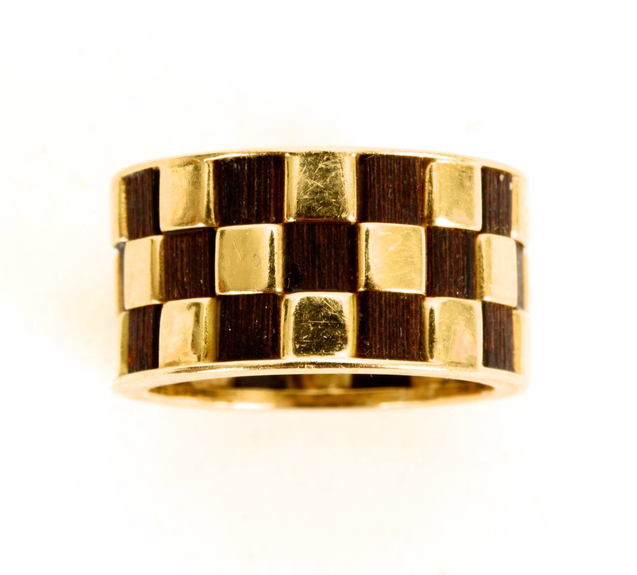 A 18kt gold and ebony band in a Checkerboard Design, 