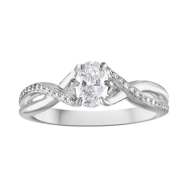 0.52 Carat Diamond Gold Oval Engagement Ring at 1stDibs