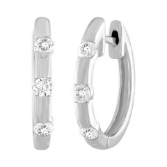 Boucles d'oreilles créoles en or avec diamants 0,25 carat