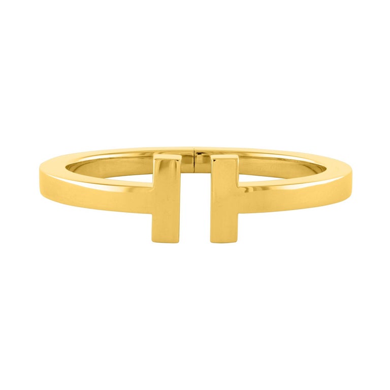 Tiffany and Co. Diamond Gold Platinum Etoile Bangle Bracelet at 1stdibs