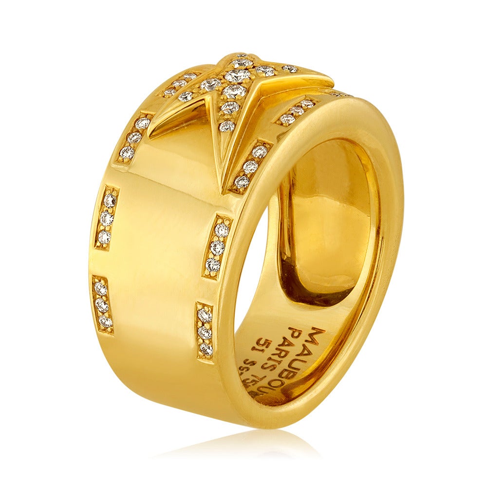 Mauboussin Etoile Divine Ring
The ring is 18K Yellow Gold
There are 0.35 Carats in Diamonds F/G VS/SI
The ring is a Size 51 or 5.5, not sizable.
The ring weighs 11.4g
The ring comes with Mauboussin Card
