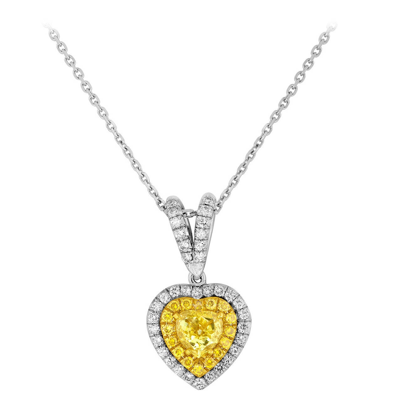 0.81 Carats Fancy Intense Yellow Heart Gold Pendant Necklace For Sale