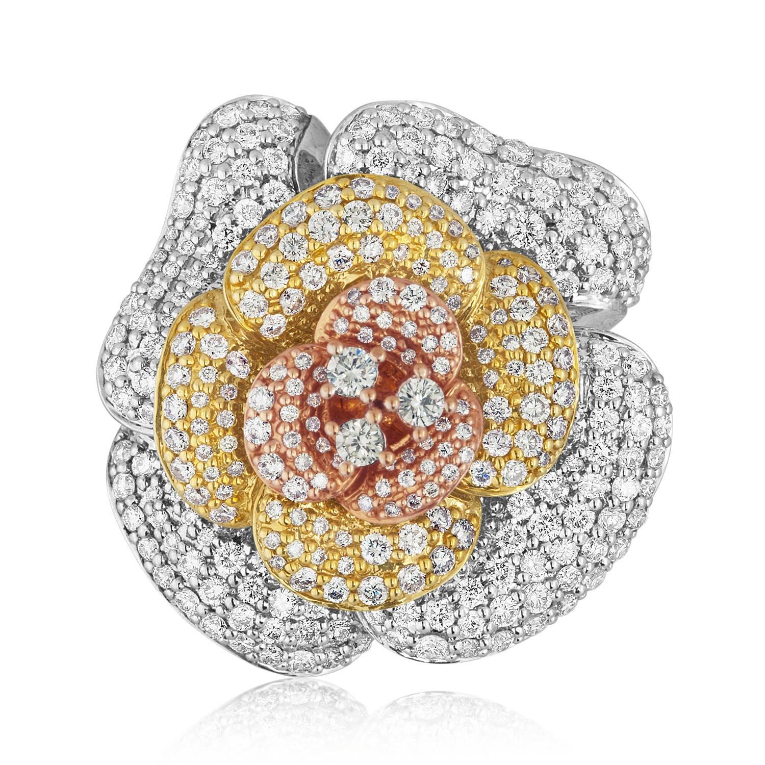 Multi Tone Diamond Large Flower Ring
The ring is 14K White, Yellow & Rose Gold
There are 5.50ct G/H VS Diamonds
The ring is a size 9, sizable.
The ring weighs 19.8 grams