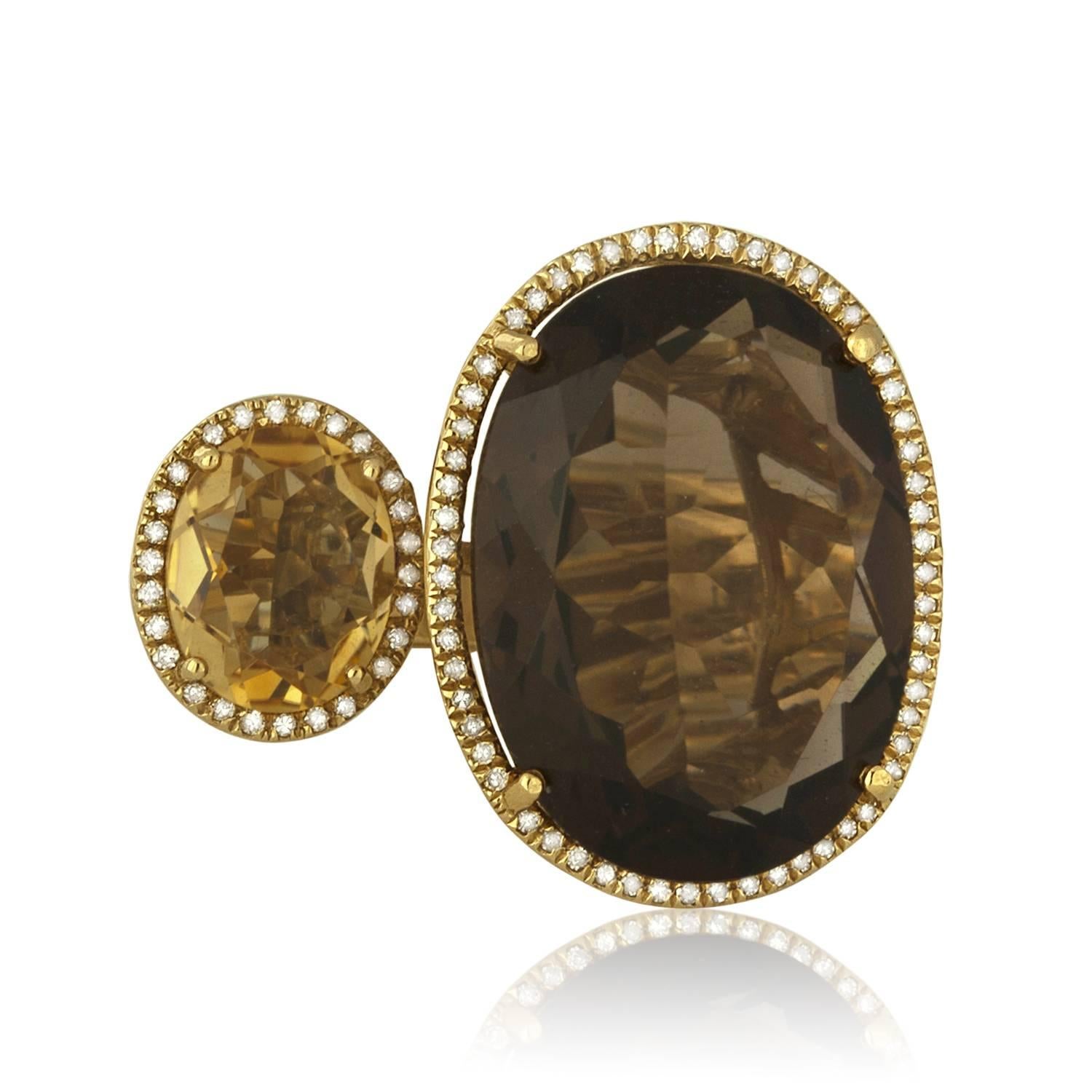 The stones are set in 14K Yellow Gold
The ring has a large Smoky Quartz 17.60ct 
It also has a Citrine 2.15ct.
These beautiful stones are surrounded by diamonds 0.26ct.
The ring is a size 6.75
The ring weighs 10.8 grams