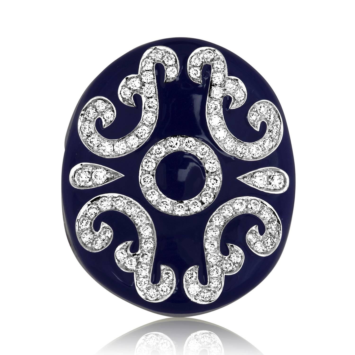 The ring is 18K white gold.
The ring has 0.84 Carat F VS Diamonds.
It has Beautiful Deep Blue Enamel.
Serial #9567.
The ring is a size 7.5, sizable.
The ring measures on top 1
