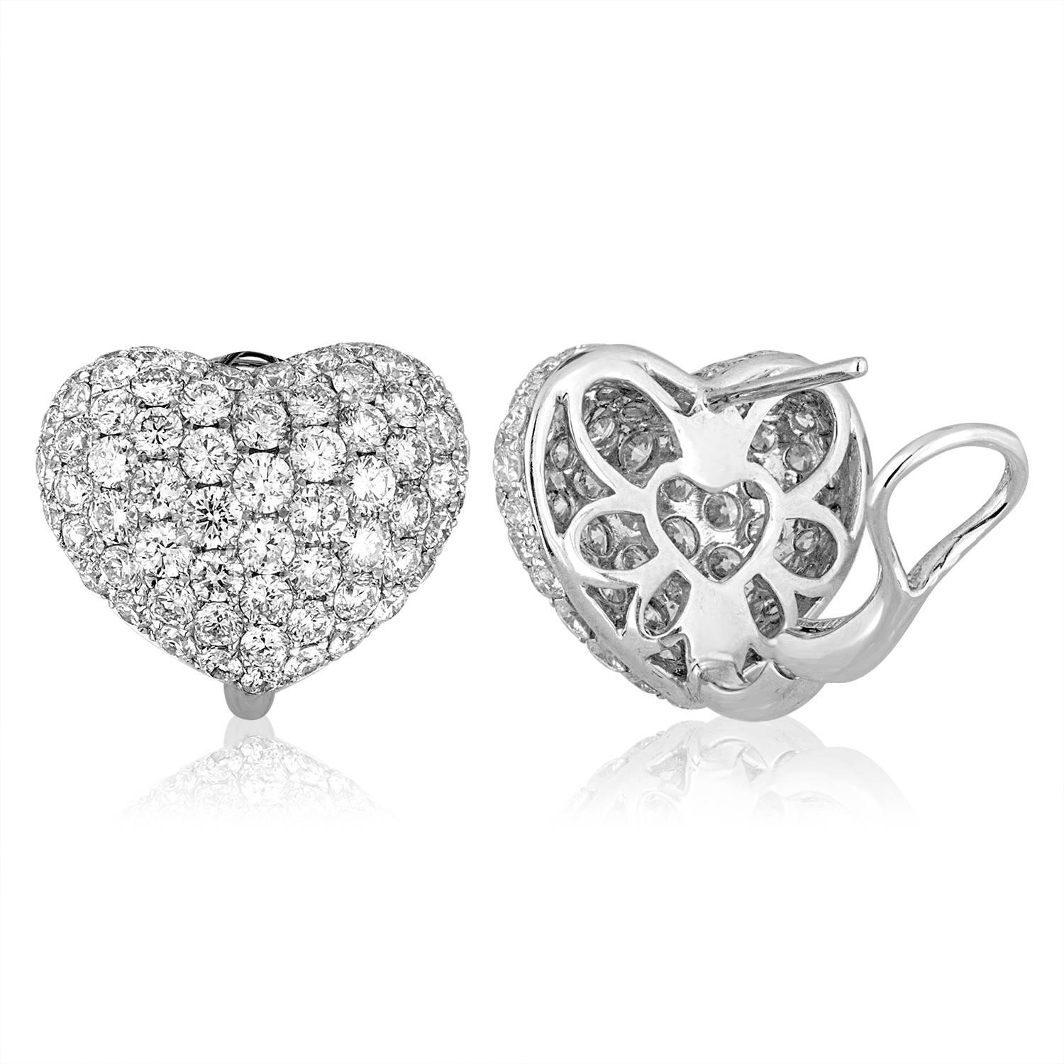 The heart pave earrings
The earrings are 18K White Gold
There are 4.62 Carats in Diamonds F/G VS/SI
The earrings measure 10/16