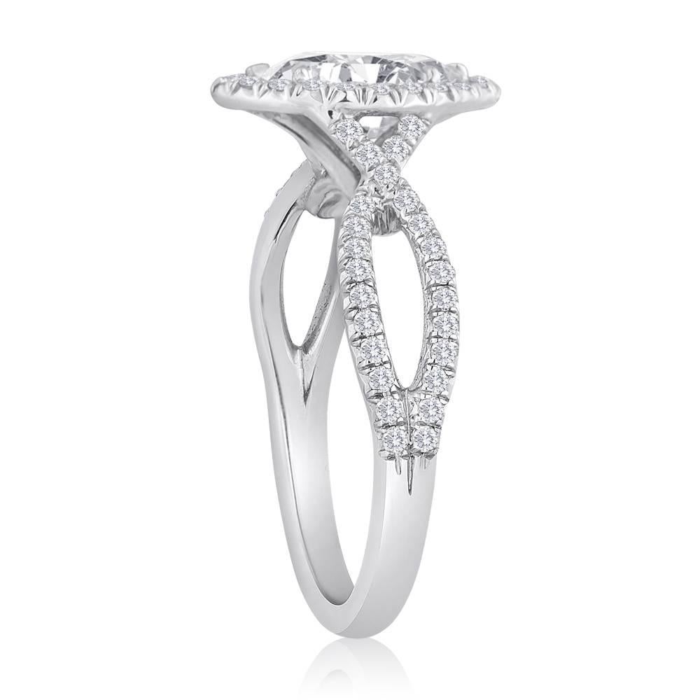 Marquise Halo Engagement Ring
The ring is 18K White Gold 
GIA Certified 0.74 Carat D SI2 Marquise Cut
There is 0.37 Carats F VS
The ring is a size 5.5, sizable.
The ring weighs 3.4 grams