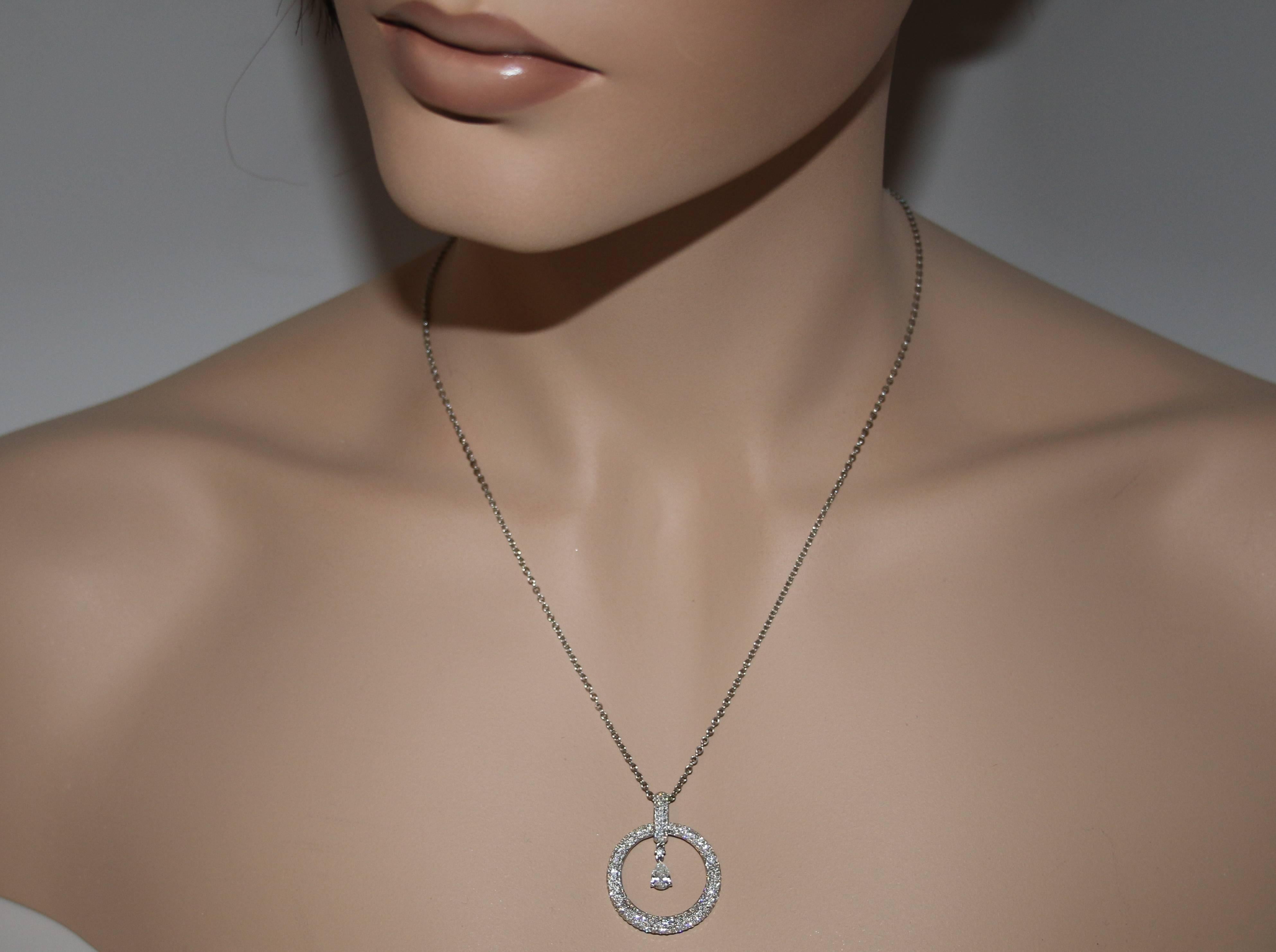 Circle Pave Diamond Necklace
The pendant is 18K White Gold
1.56Ct Diamonds F VS
0.32Ct Pear Shape Dangle Diamond F VS
The pendant is 1 1/8
