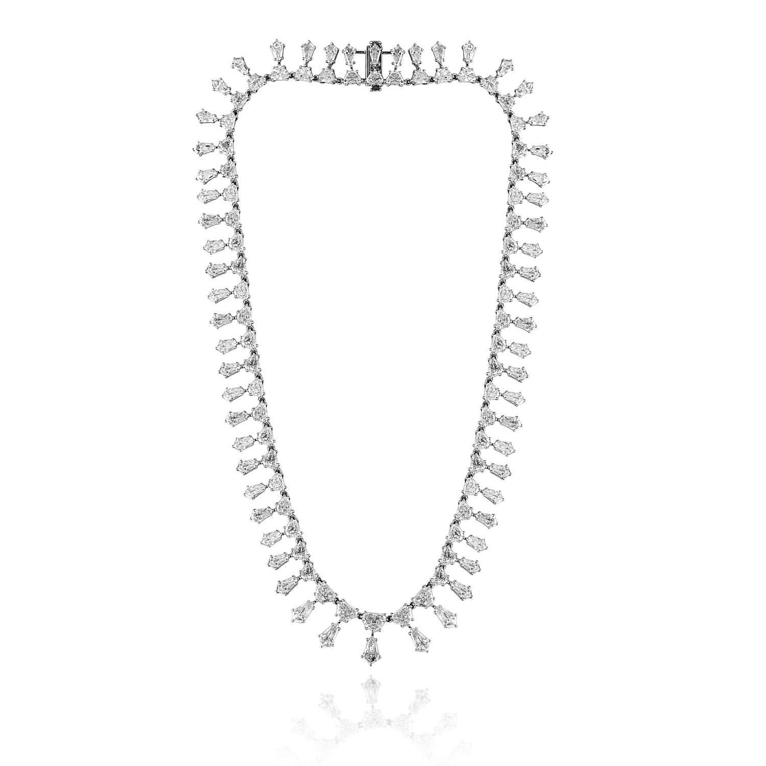 Very Stunning & Unusual Graduating Necklace
The necklace is made from bullets & Cadillac step cut diamonds.
The necklace has 37.40Ct I/J VS
The necklace is 18K White Gold
The necklace weighs 43.1 grams
It measures 16