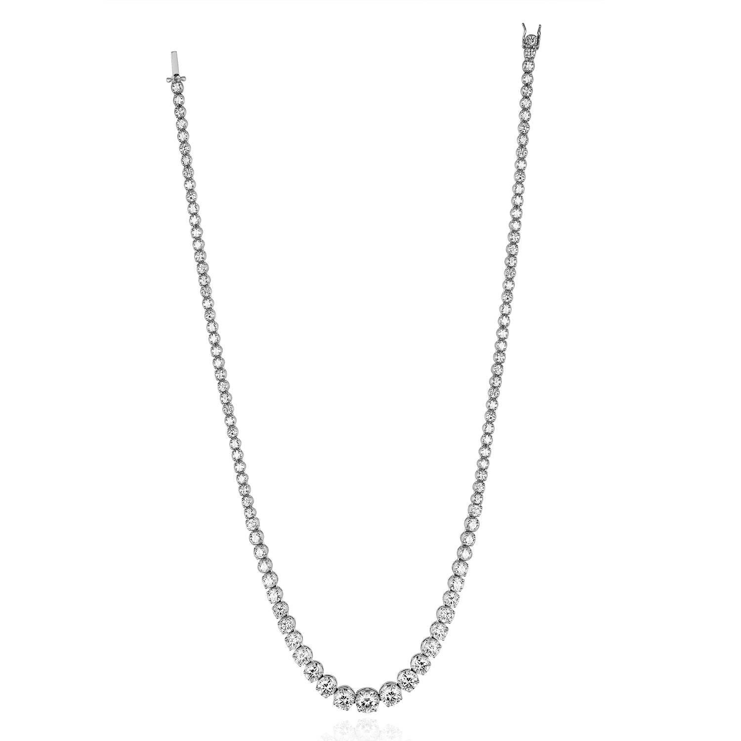 Very Classic Riviere Necklace
The necklace is 18K White Gold
There are 13.10Ct in Diamonds G/H VS
The necklace weighs 27.7 grams
The necklace is 16