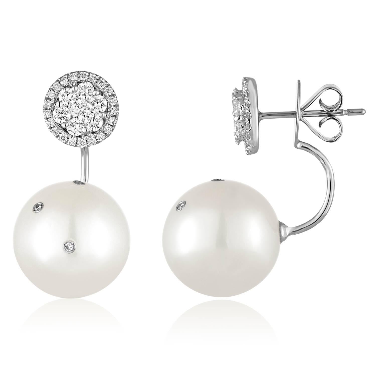 The earrings are 18K White Gold.
There are 0.82Ct Diamonds F VS.
The South Sea Pearls are 14MM.
The earrings are approximately 1