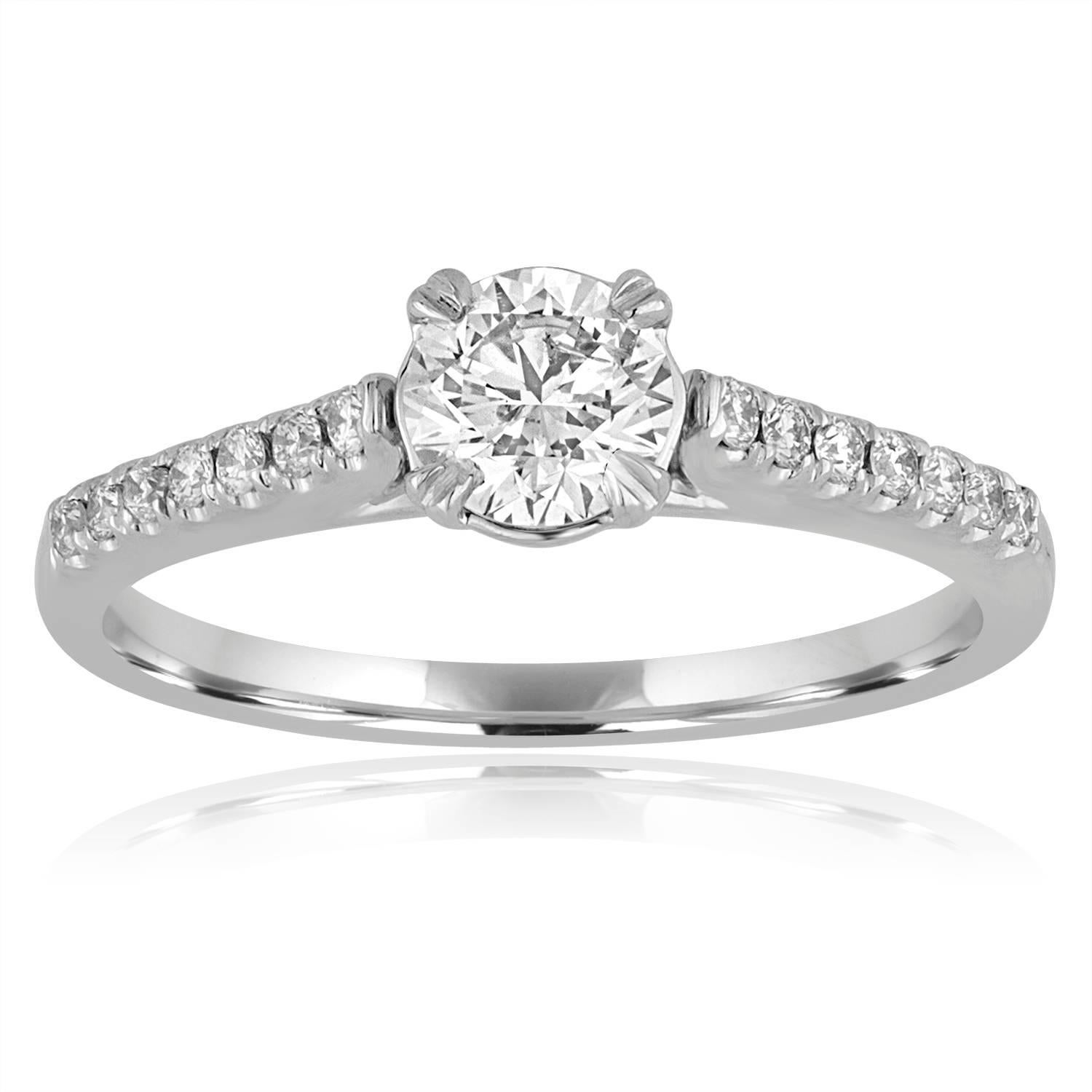 Belle parure de mariage en diamant
La parure est en or blanc 18K
La pierre centrale de la bague de fiançailles est certifiée GIA 0,54Ct E I1
La monture contient 0,15 ct de diamants F/G VS/SI 
La bague de fiançailles est une taille 6.5, de grande