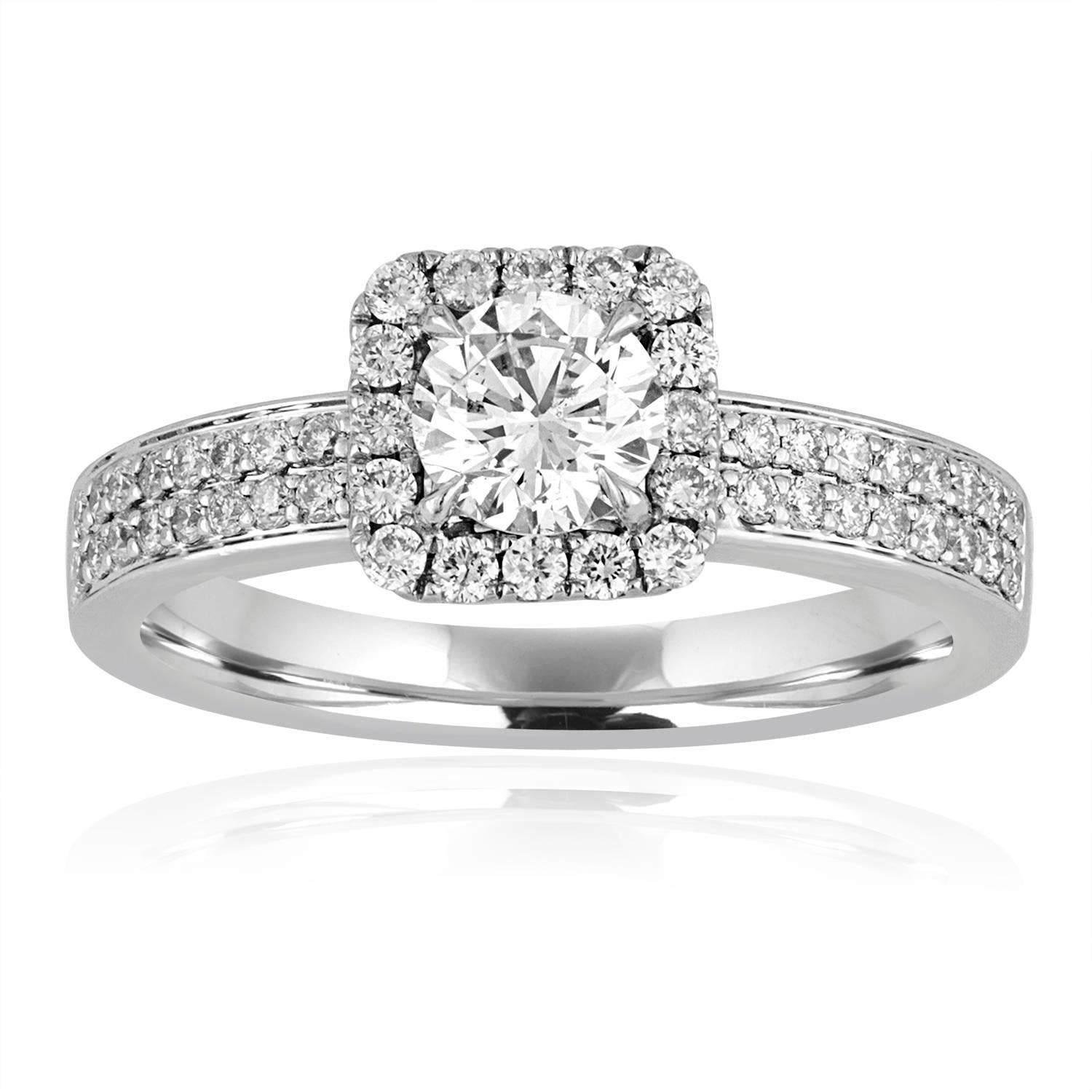 Beautiful Diamond Wedding Set
The Set is 18K White Gold
The Engagement Ring Center Stone is GIA Certified 0.55Ct H I1
The setting has 0.42Ct in Diamonds F/G VS/SI 
The Engagement Ring is a size 6.25, sizable
The Engagement RIng weighs 5.1