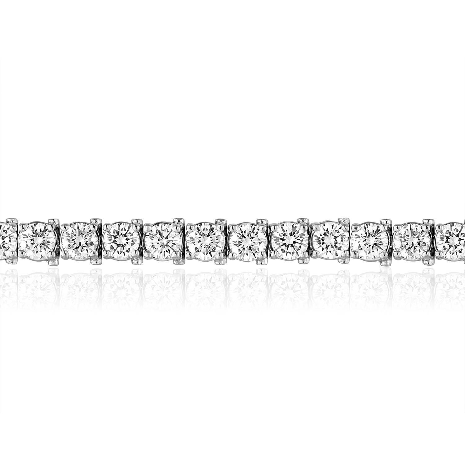 Beautiful And Classic Tennis Bracelet.
The bracelet is 14K White Gold.
There are 13.18 Carats in Diamonds G/H SI1/SI2.
There are 32 stones, each stone is 0.41 Carats.
The bracelet is 7 inches long.
The bracelet weighs 23.3 grams.
The bracelet is IGI