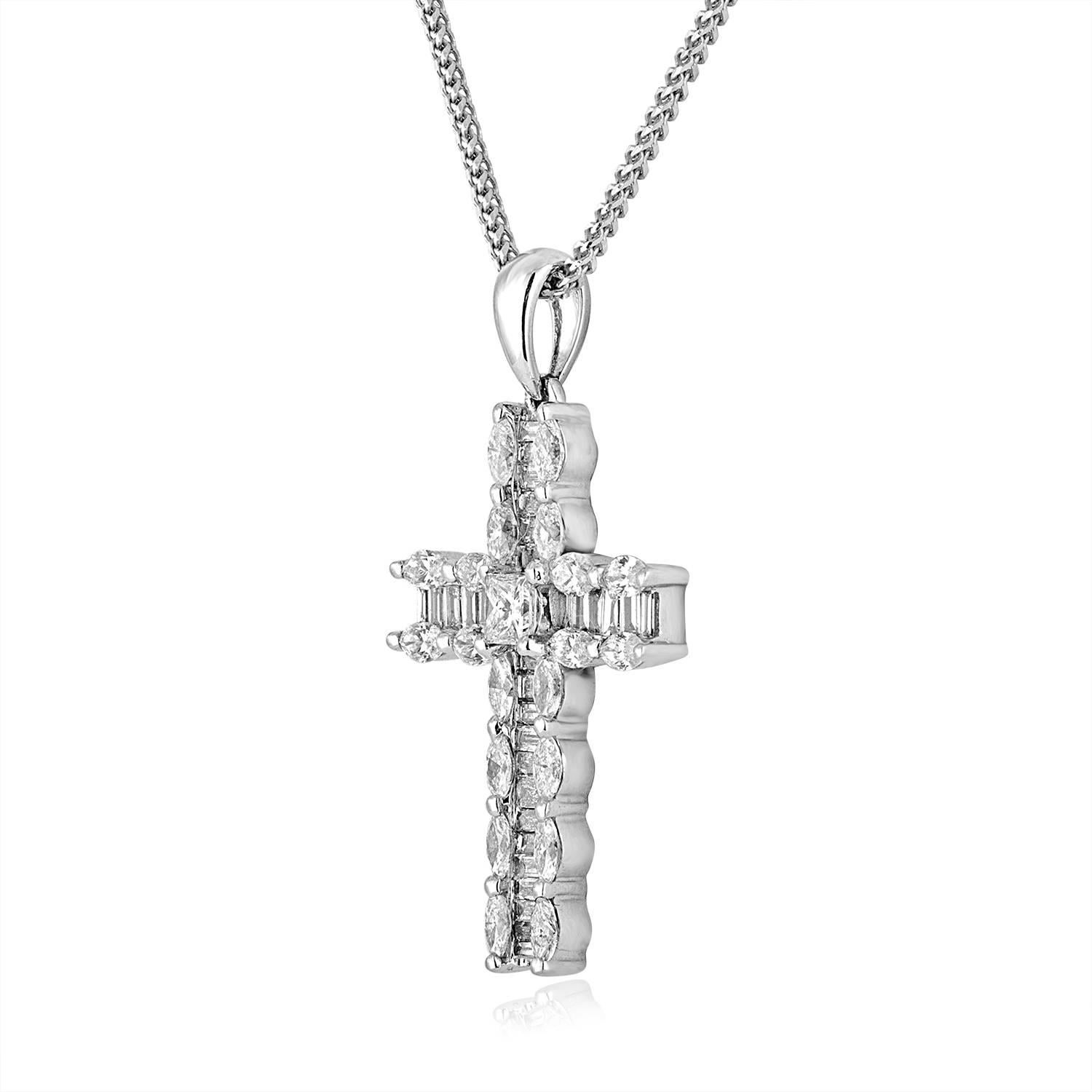 Beautiful 18K White Gold Cross
There are 1.46 Carats in Diamonds F/G VS/SI
The cross measure approximately 1.25