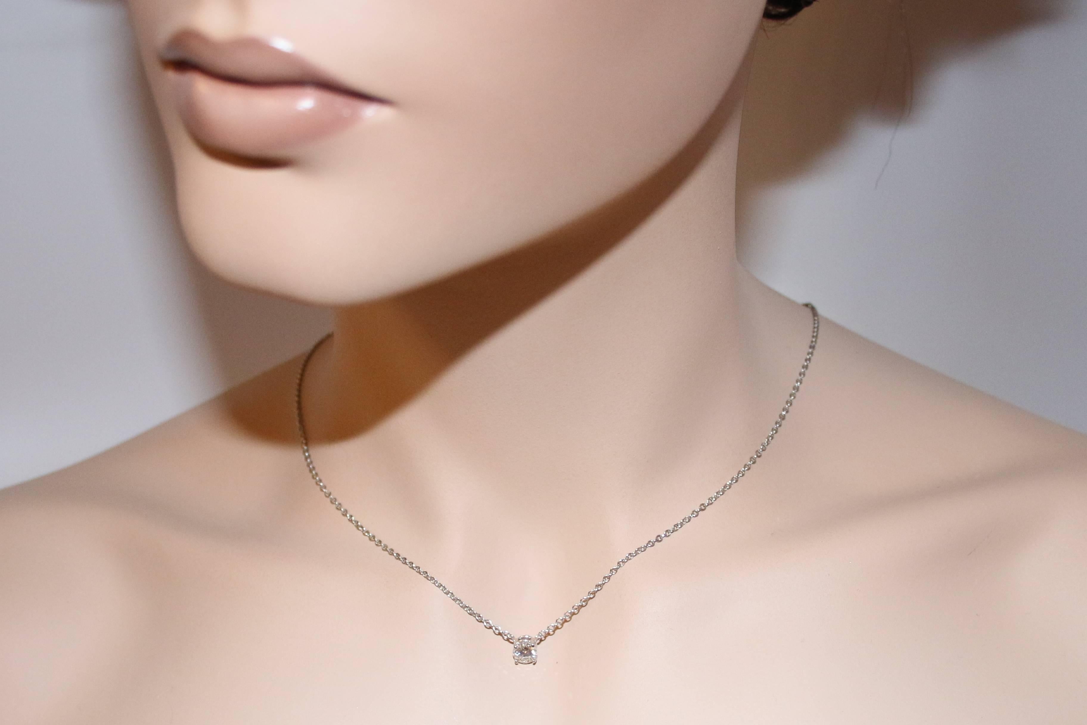 Round Brilliant Diamond Solitaire Pendant Necklace
The necklace is 14K White Gold
The Diamond is GIA Certified 0.51 Carat D I1
Necklace measures 18