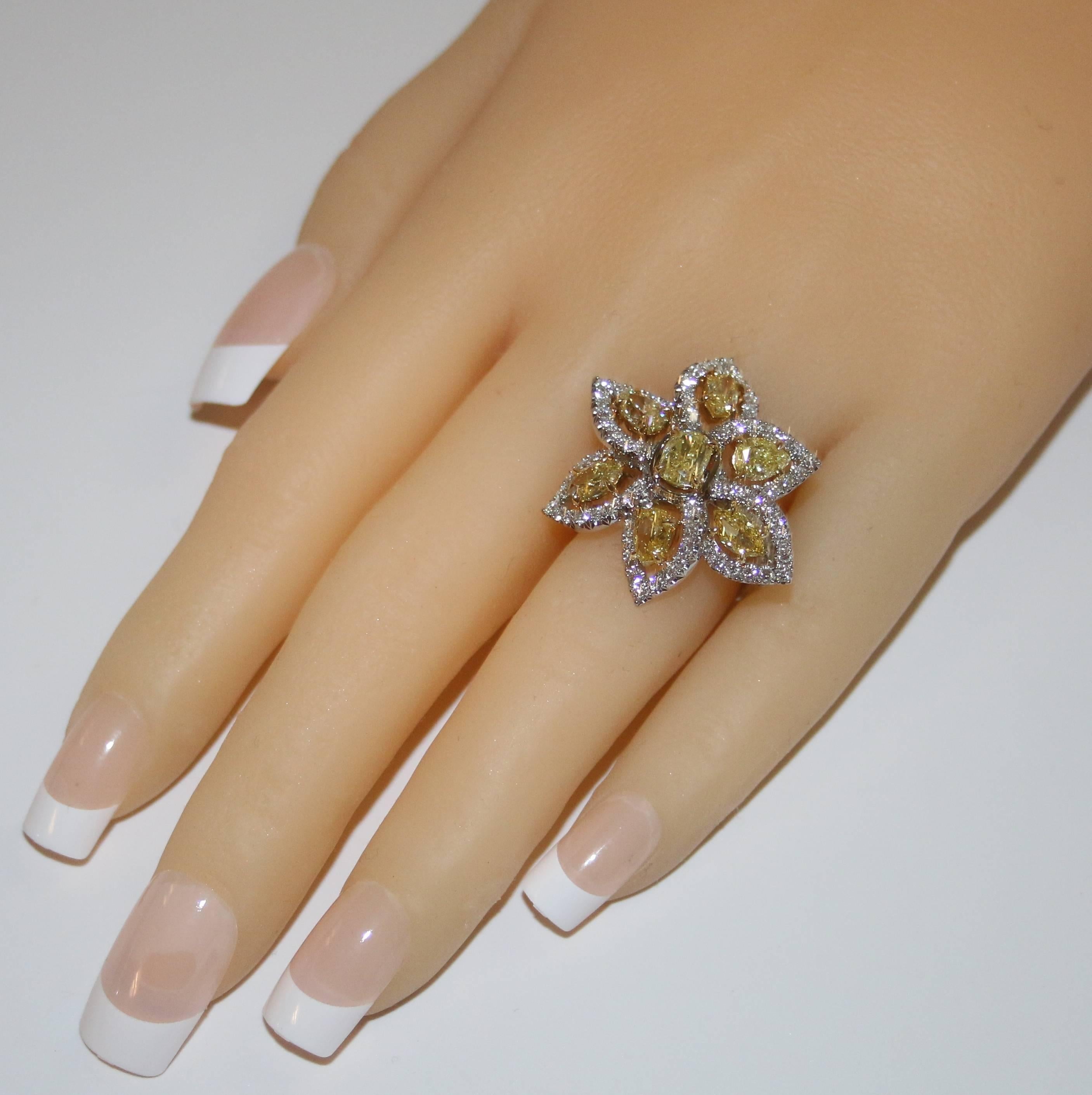 Contemporary 5.24 Carats Fancy Yellow and White Diamonds Gold Platinum Flower Ring For Sale