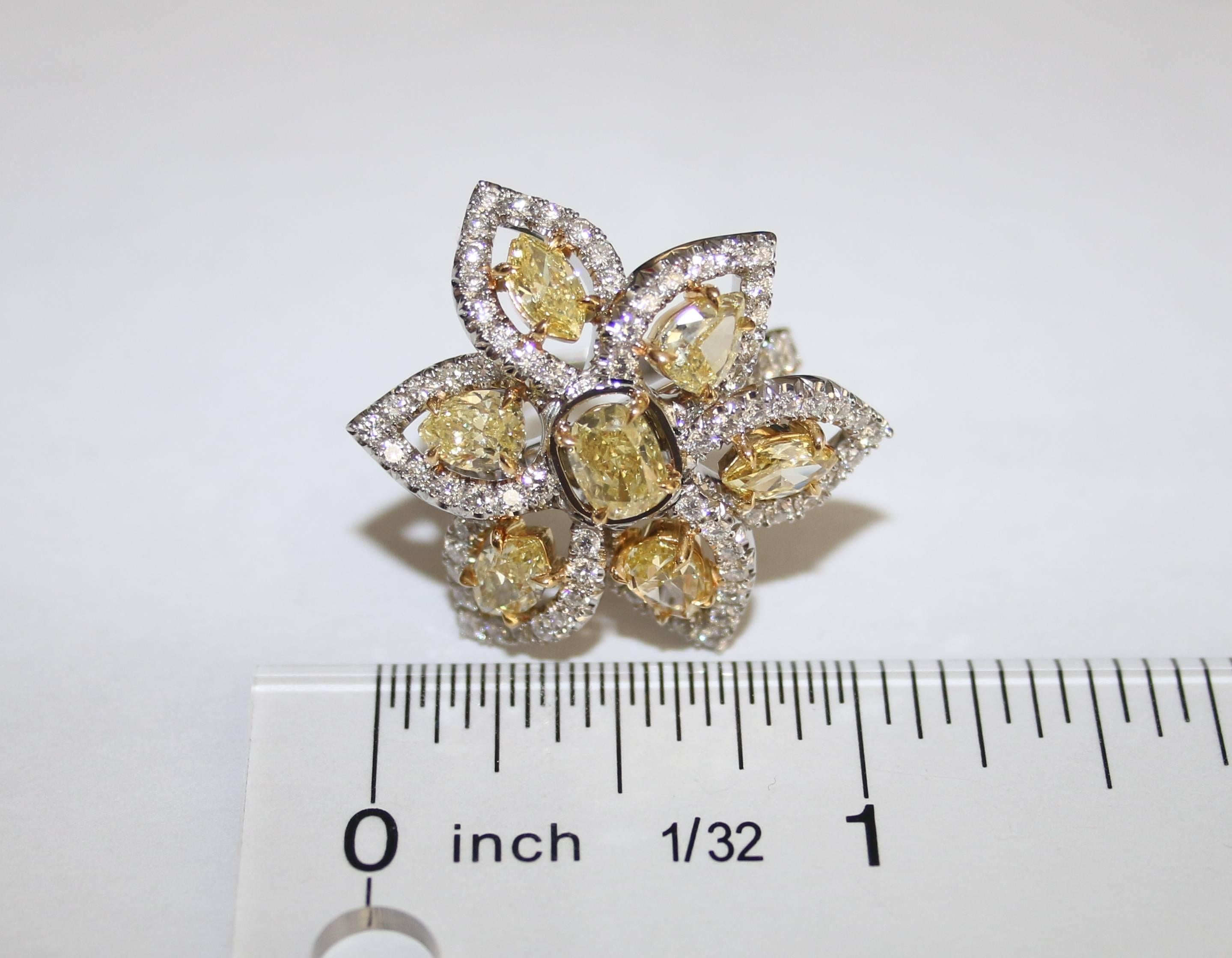 Pear Cut 5.24 Carats Fancy Yellow and White Diamonds Gold Platinum Flower Ring For Sale