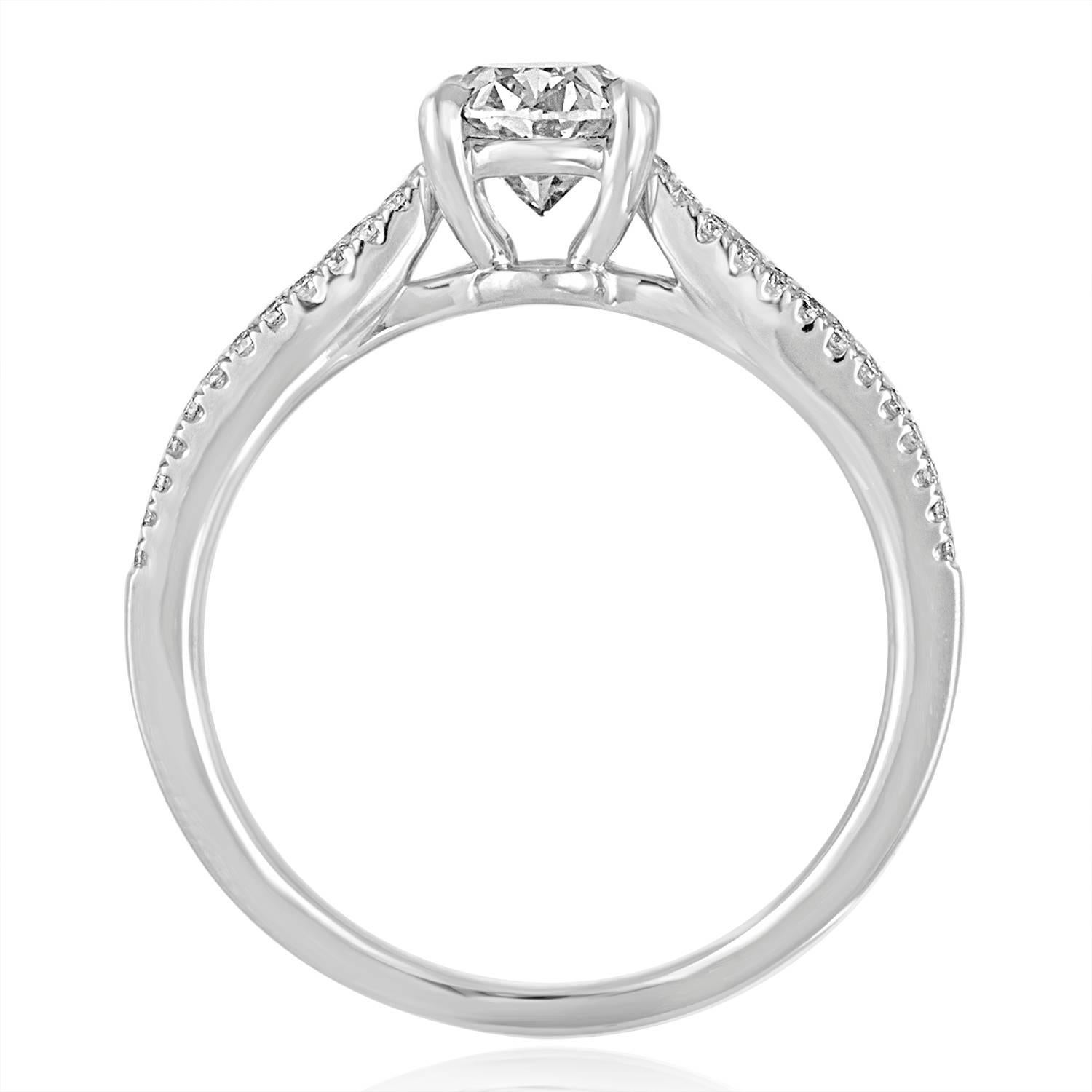 Beautiful Oval Engagement Ring
The ring is 18K White Gold
The center stone is an Oval 1.03 Carats D VS2 GIA Certified
The setting has 0.73 Carats in White Diamonds F/G VS/SI
The ring is a size 6.75, sizable.
The ring weighs 4.2 grams.