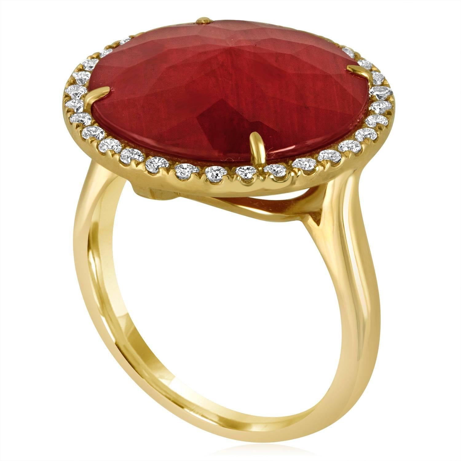 Sliced to display their natural variations in character.
The ruby slices are topped with clear faceted rock crystal.
The slices are set in 14K Yellow Gold and surrounded by Diamonds.
There are 0.39ct in Diamonds G SI.
There are 5.10ct in Ruby and