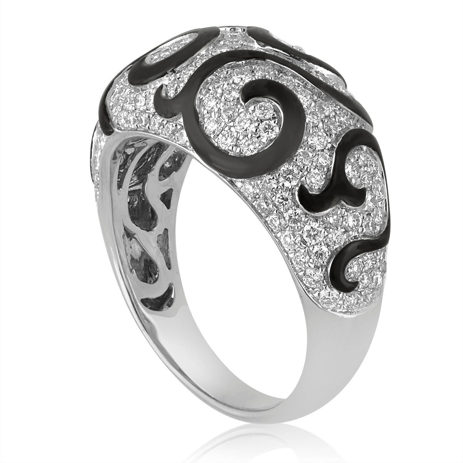 Very Beautiful Modern Dome Cocktail Ring
The ring is 18K White Gold
The ring has 1.15 Carat in Diamonds F/G VS.
The ring has beautiful black enamel swirls.
The ring is a size 7, sizable.
The ring weighs 6.8 grams.