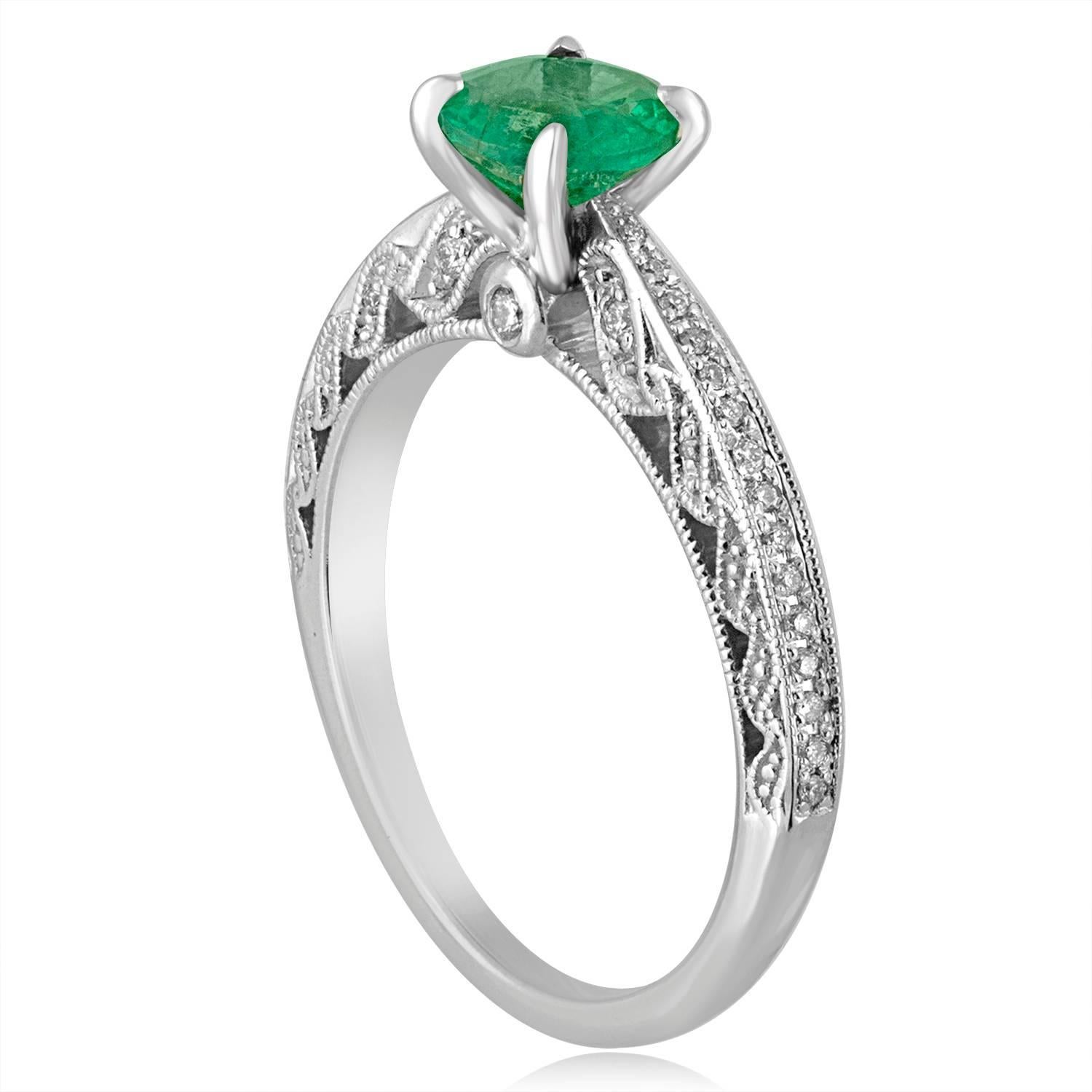 Stunningly Simple Emerald Milgrain Ring
The ring is 14K White Gold.
The Emerald is a round 0.72 Carat Natural Emerald
There are 0.25 Carats in Diamonds F SI
The ring is a size 6.5, sizable.
The ring weighs 3.2 grams