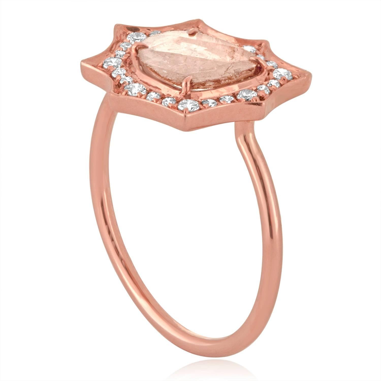 Very Delicate and Fun Ring.
The ring is 14K Rose Gold.
The center stone is a Diamond Slice about 0.50 Carats.
The small Diamonds are Yellowish-Silver about 0.35 Carats.
Any imperfections in the stone is due to the natural state of the diamond.
The