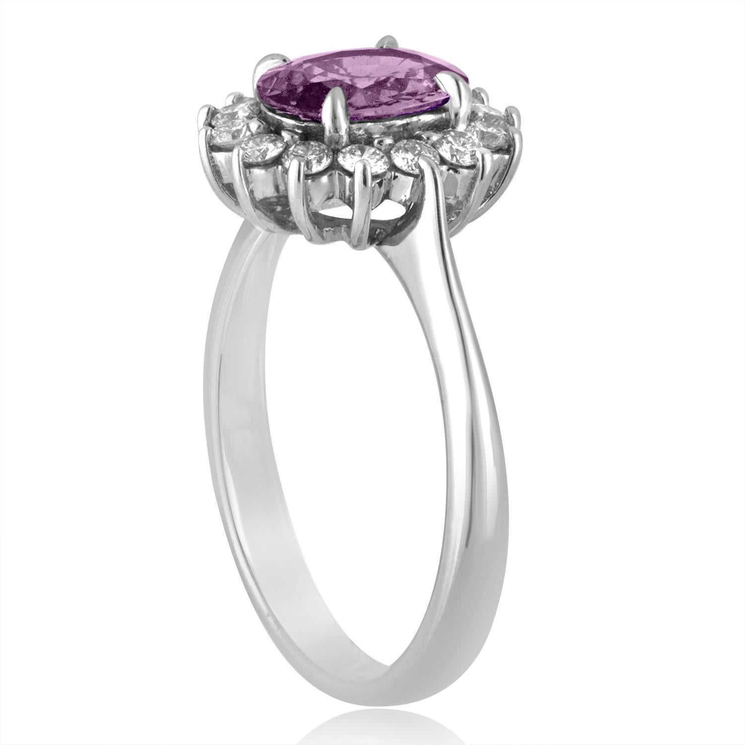 Classy Violet Sapphire Ring
This is an 14K White Gold Ring
The center is a Certified NO HEAT Oval Violet Sapphire 1.32 Carats.
The sapphire is certified by LAPIS.
There are 0.37 Carats in Diamonds G VS.
The ring is a size 6.75, sizable.
The