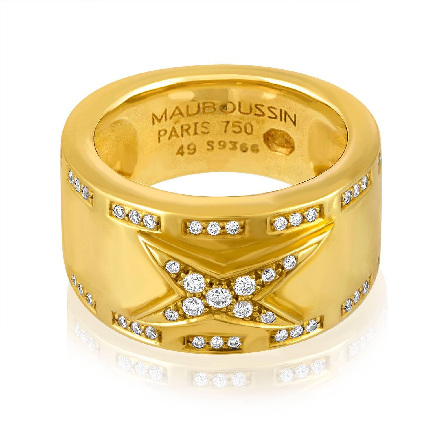 Mauboussin Etoile Divine Gold Band Ring
The ring is 18K Yellow Gold
There are 0.35 Carats in Diamonds F/G VS/SI
The ring is a size 5
The ring weighs 10.9 grams