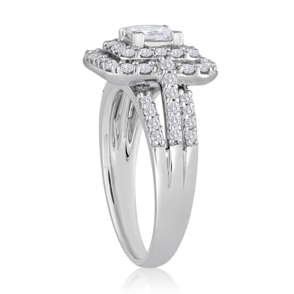 Beautiful Double Halo Engagement Ring
The ring is 18K White Gold
The center stone is a princess cut diamond 0.51Ct G SI
The setting has 0.77Ct in Diamonds F/G VS/SI
The ring is a size 6.75, sizable.
The ring weighs 7.3 grams.