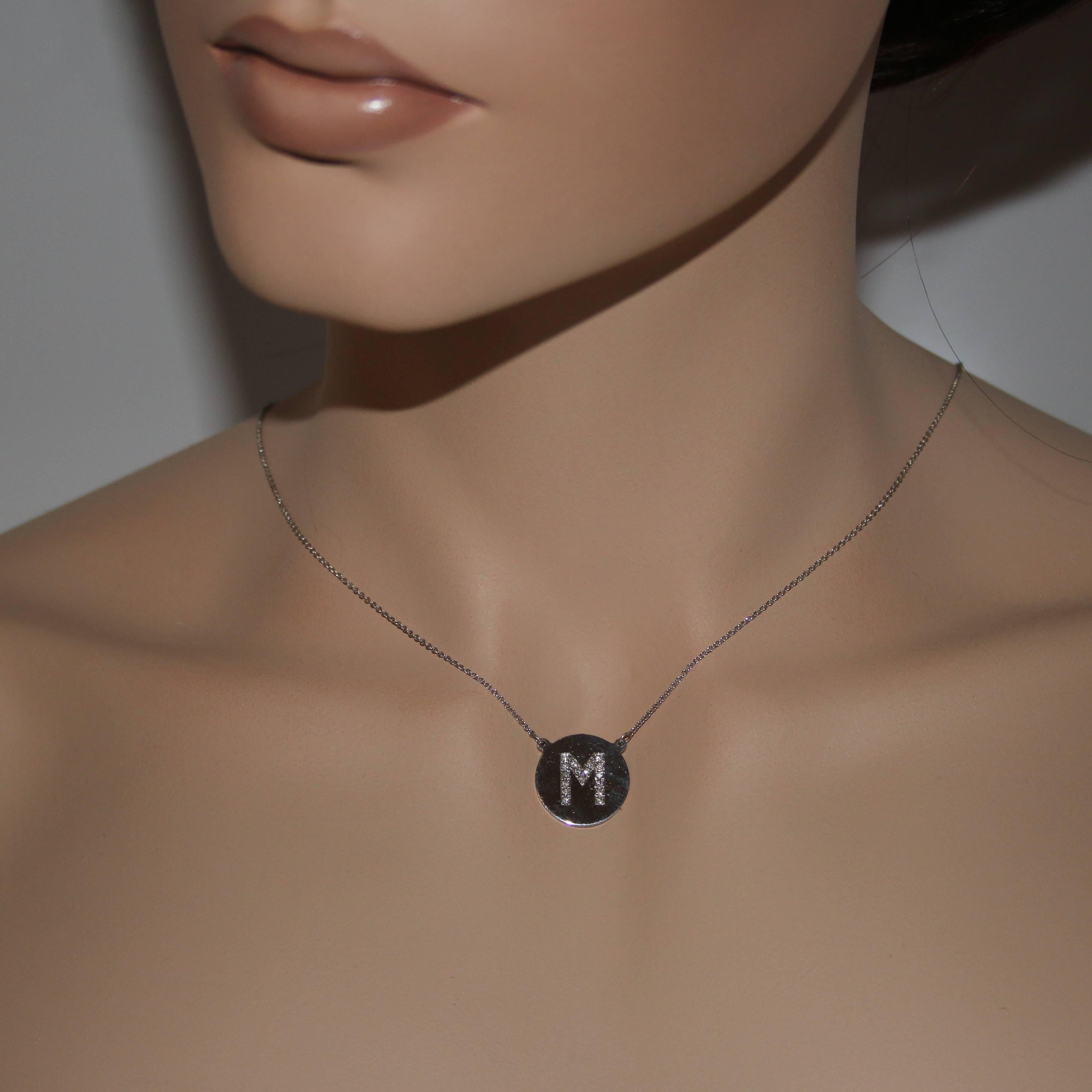 Beautiful Initial Necklace
The necklace is 14K White Gold
There are 0.13 Carats in Diamonds G/H SI
The pendant is 5/8