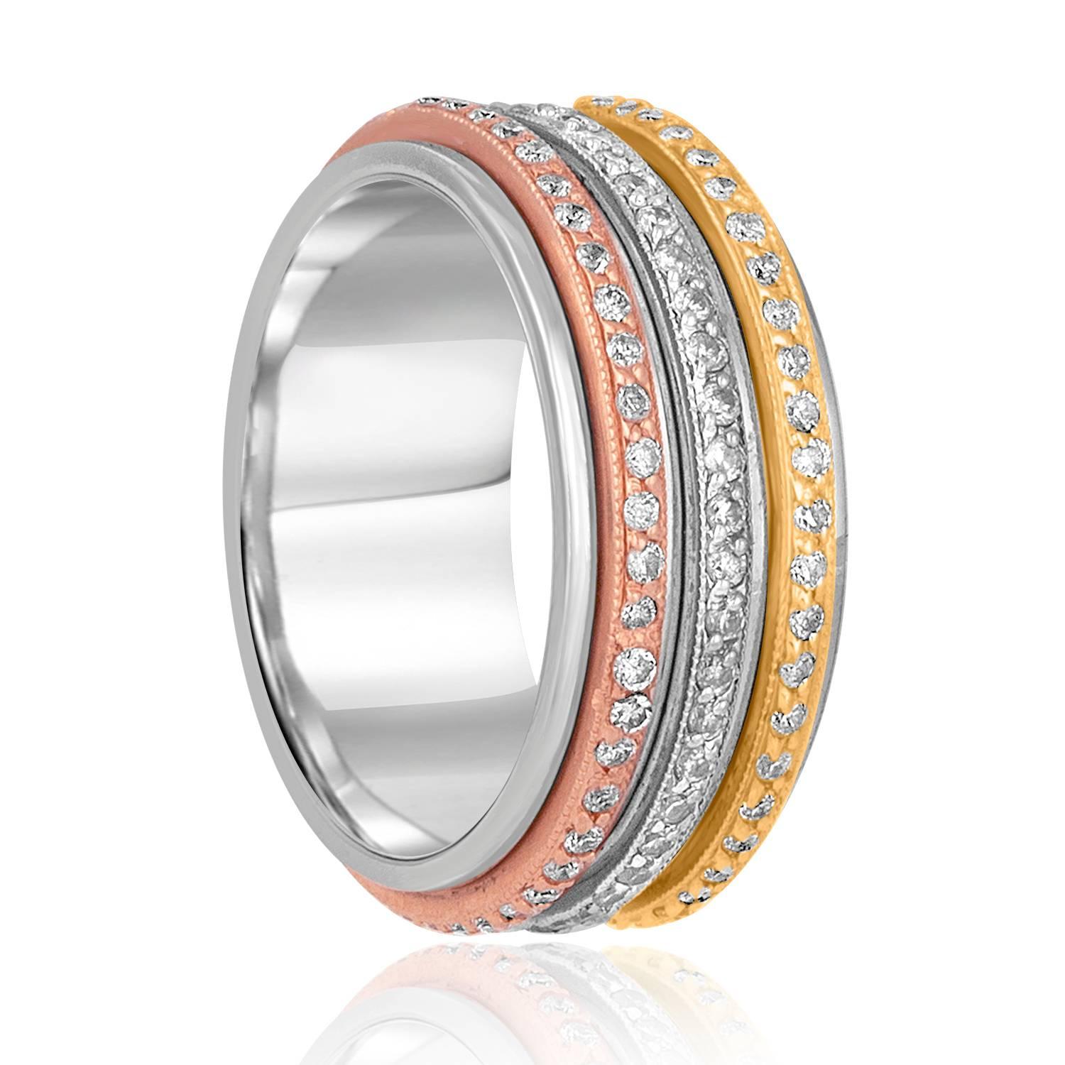 Spin Wedding Band Ring
The ring is Tri-Color Spin Ring.
Each band spins independently.
The ring is 14K White, Rose & Yellow Gold.
There are 0.71 Carats in Diamonds G/H SI
The ring is 5/16