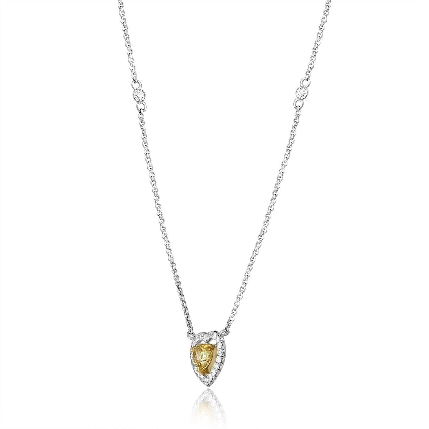 Beautiful Fancy Yellow Necklace
The Halo Necklace is 18K White & Yellow Gold
The Fancy Yellow Heart is 0.48 Carats VS Clarity
There are 0.24 Carats In Diamonds G VS
The halo pendant is about 9mm x 10mm.
The necklace is 16.75