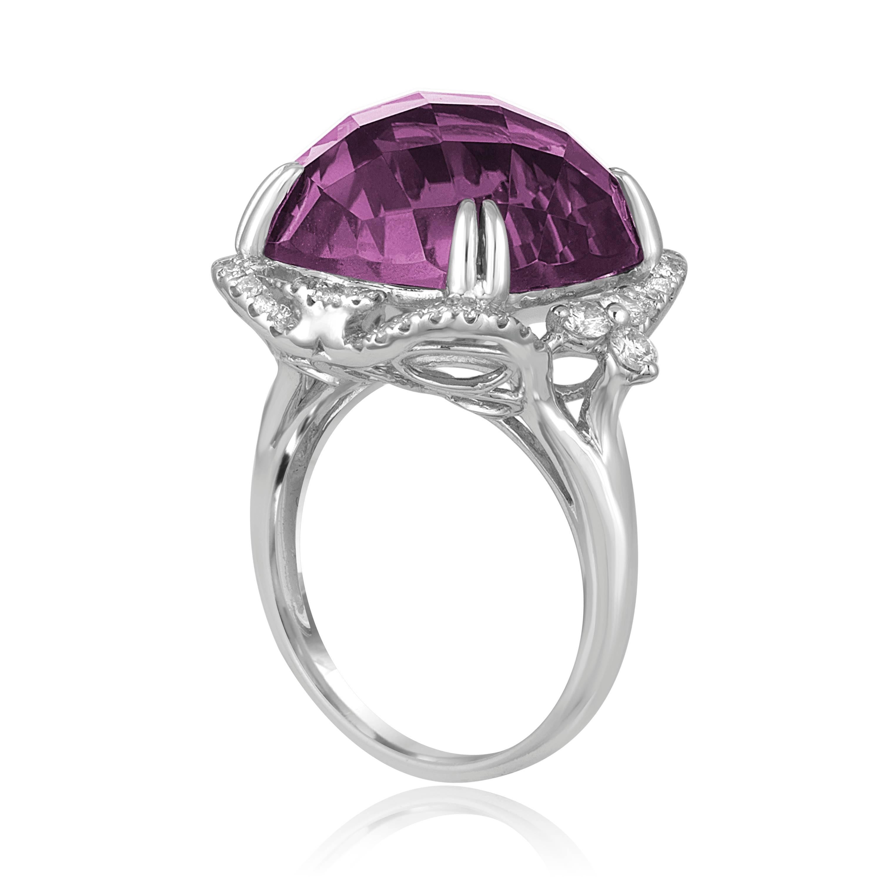 Fun Large Ring.
The ring is 18K White Gold.
There are 0.58 Carats in Diamonds F SI.
The Amethyst is 15.48 Carats .
The top measures 0.75