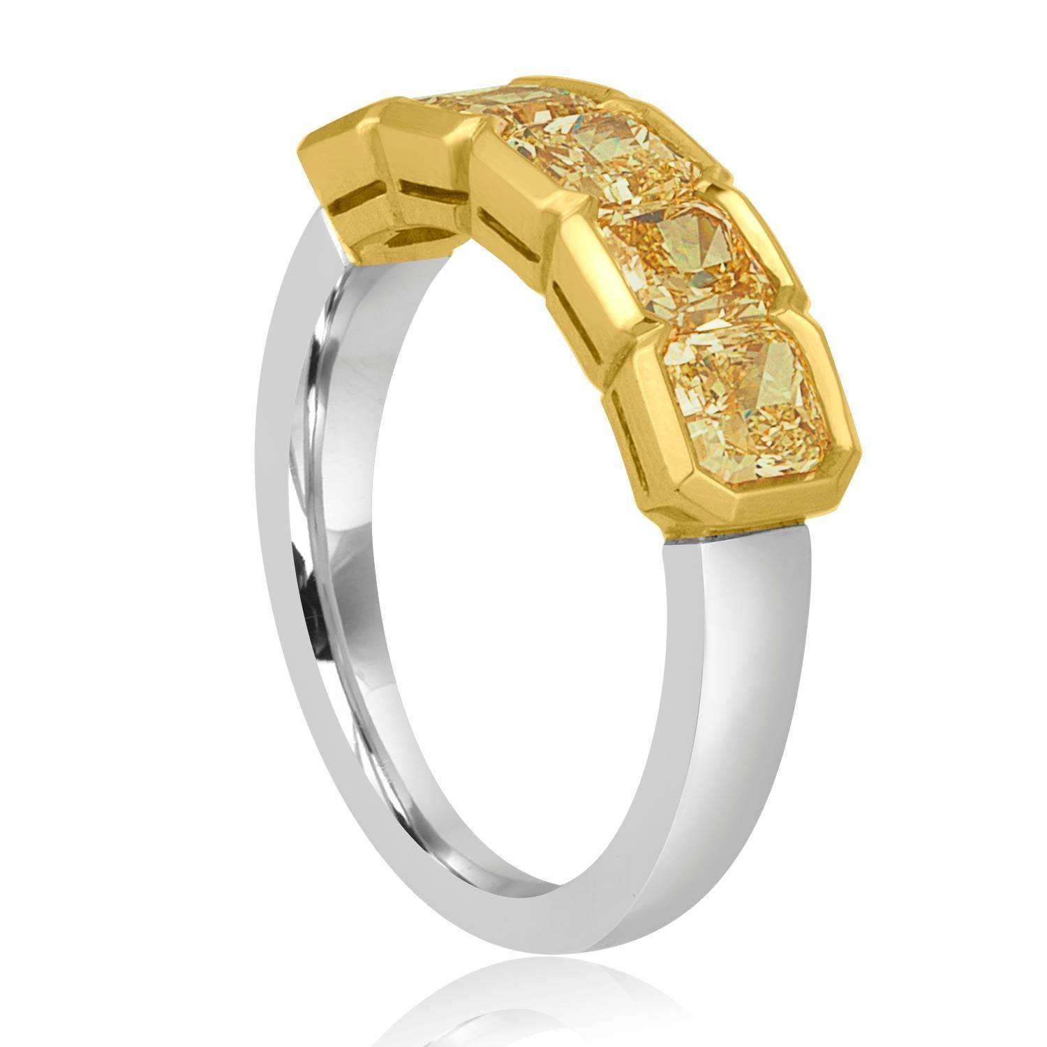 Very Beautiful Half Diamond Band Ring
The ring is 18K Yellow Gold & PLT 950
There are 5 Radiant Cut Fancy Yellow Diamonds set in Bezel.
There are 1.83 Carats In Diamonds VS
The ring is a size 5.25, sizable.
The band is 5.7 mm wide.
The ring