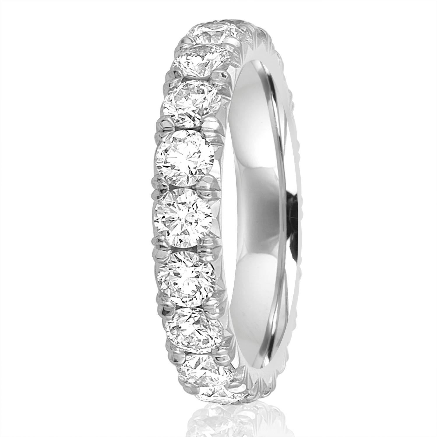 The ring is Platinum
There are 2.10 Carats In Diamonds F/G VS
The diamonds are round brilliant
The ring weighs 6.8 grams
The ring is a size 4.5, not sizable.