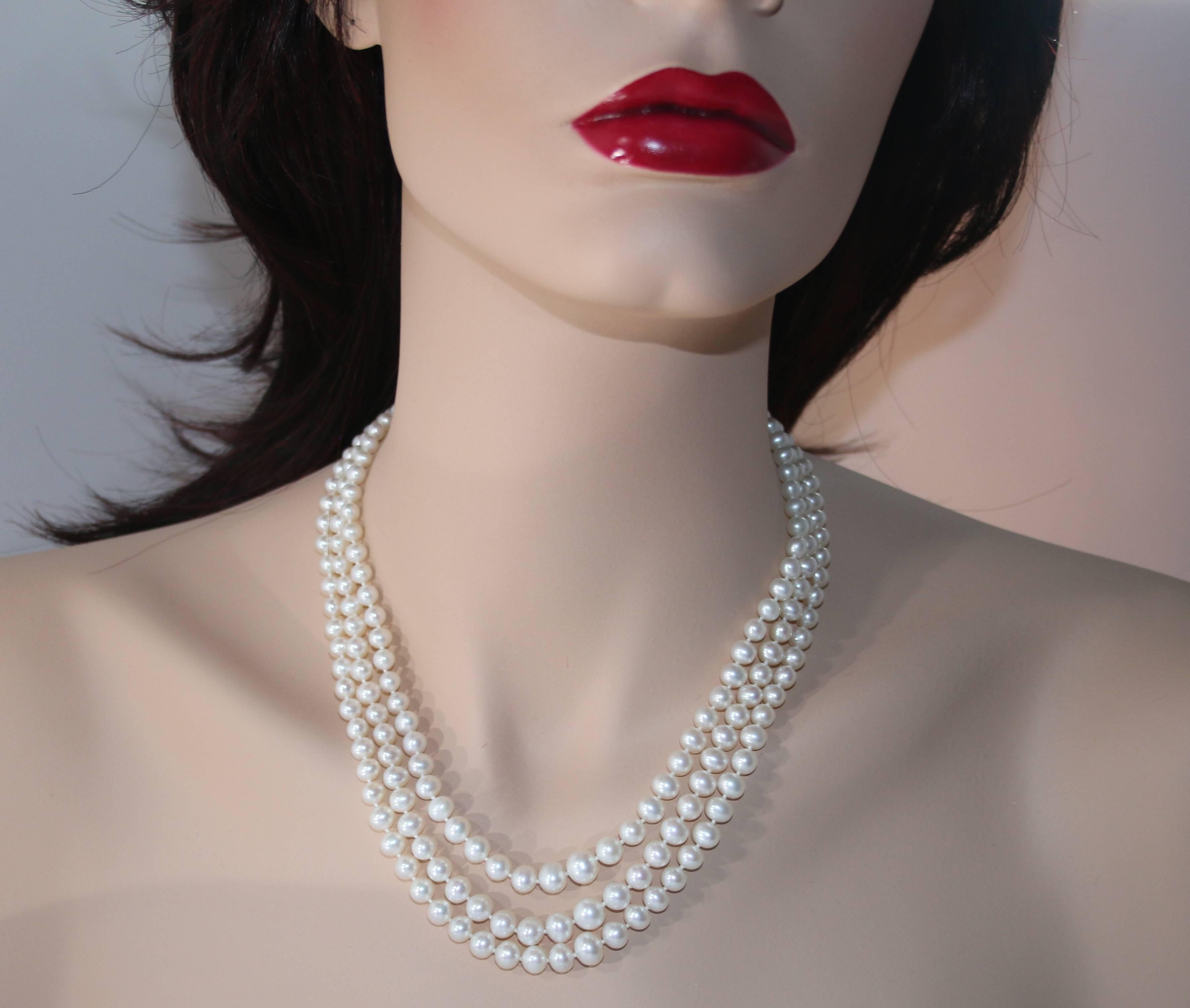 Very Classic 3 Strand Pearl Necklace
The clasp is 14K Yellow Gold
The pearls measure 4.5mm - 8.2mm
The pearls are oval or egg shaped.
The pearls are fresh water cultured.
The inner strand is 16