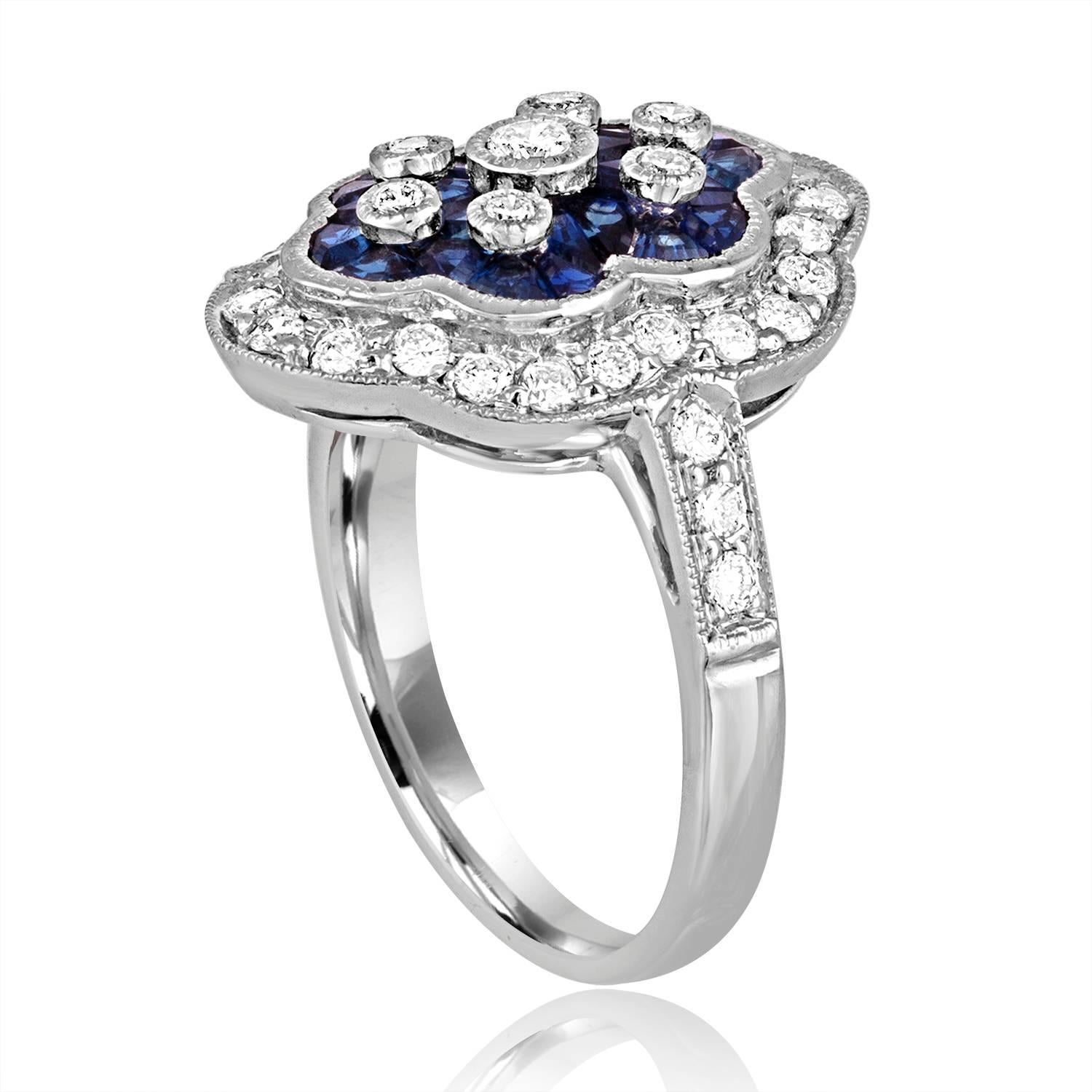 Art Deco Revival Style Ring.
The ring is 18K Whte Gold
There are 0.55 Carats in Diamonds H SI
There are 0.65 Carats in Blue Sapphires
The ring is a size 6.75, sizable.
The ring measures 0.75