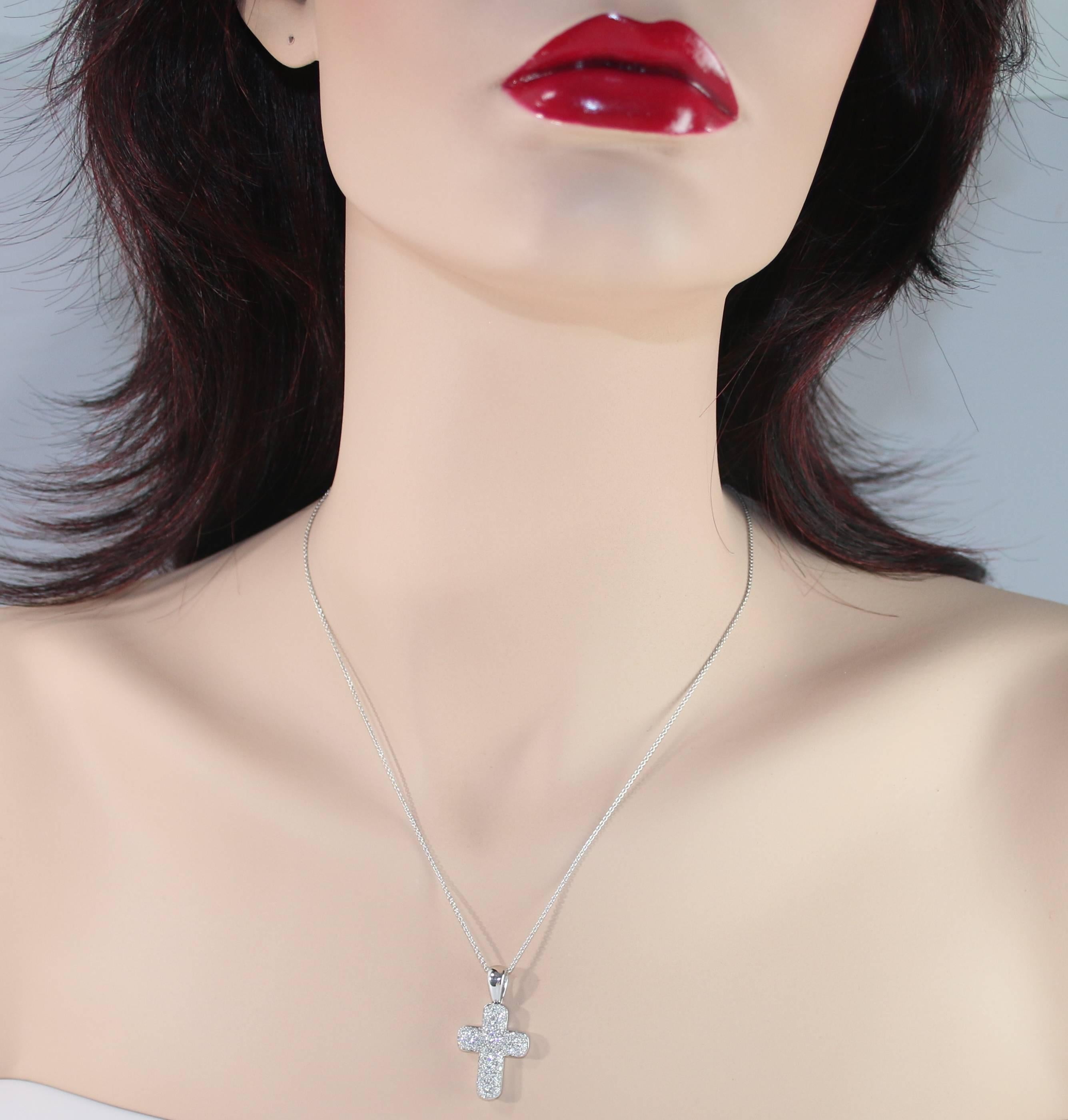 The cross is is 18K White Gold
There are 1.30 Carats in Diamonds F VVS
The cross is by DAMIANI made in Italy
The chain is 18K Gold Made in Italy
The cross with the bail measures 1.25