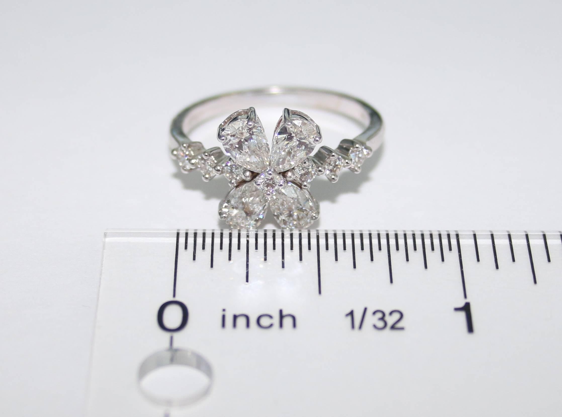 Pear Cut 1.58 Carats Diamond Flower White Gold Ring For Sale