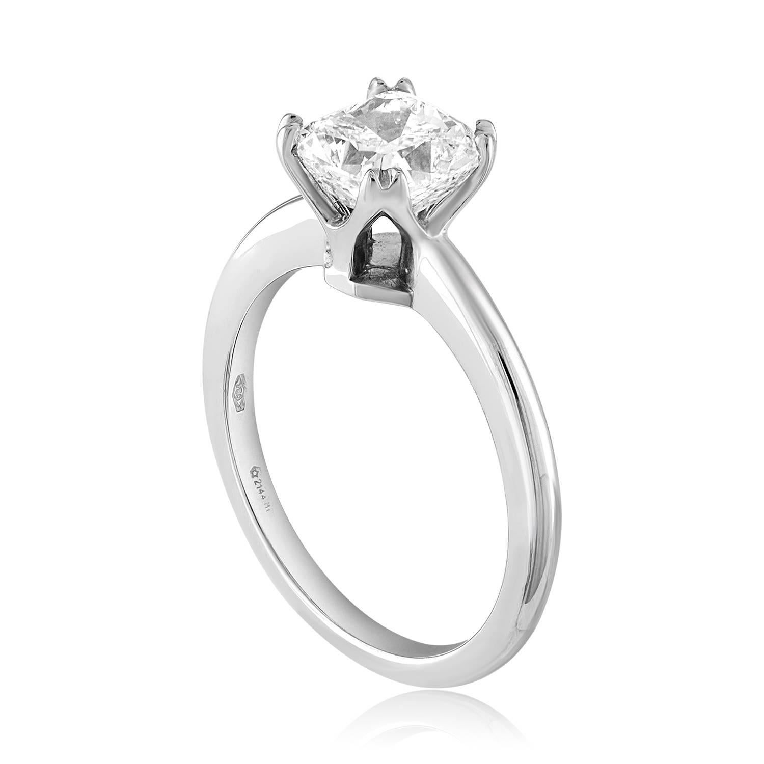Solitaire Engagement Ring
The ring is 18K White Gold
The center Is Cushion Cut Stone, GIA Certified 1.70Ct G VS1
The ring is a size 6.5, sizable.
The ring weighs 3.9 grams