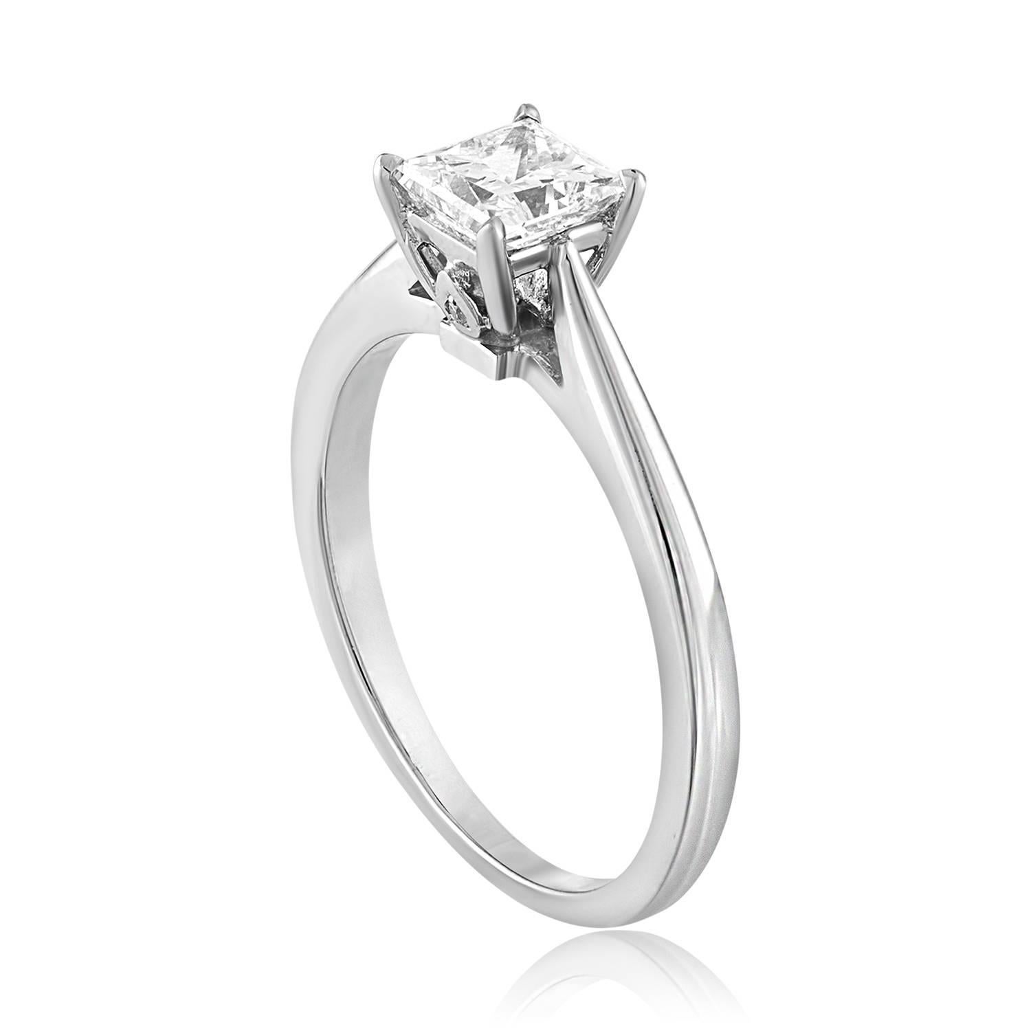 Solitaire Engagement Ring
The ring is 18K White Gold
The center Is Princess Cut Stone, GIA Certified 0.73Ct E VS2
There are 0.01 Ct in small diamonds F VS
The ring is a size 5.75, sizable.
The ring weighs 2.8 grams