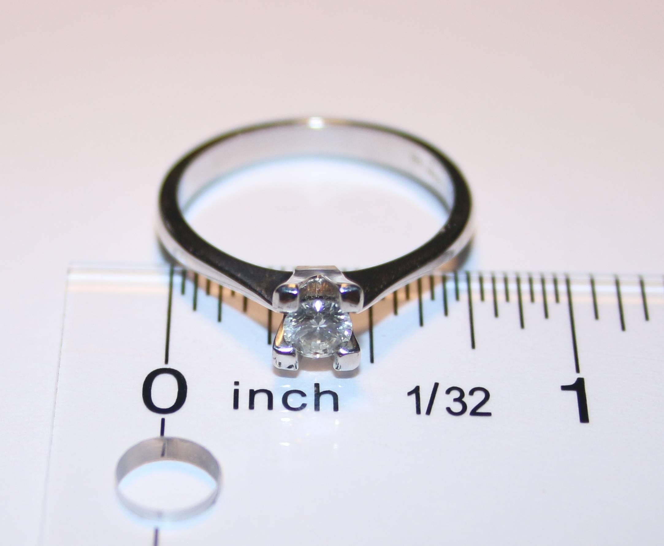 0.27 carat diamond ring