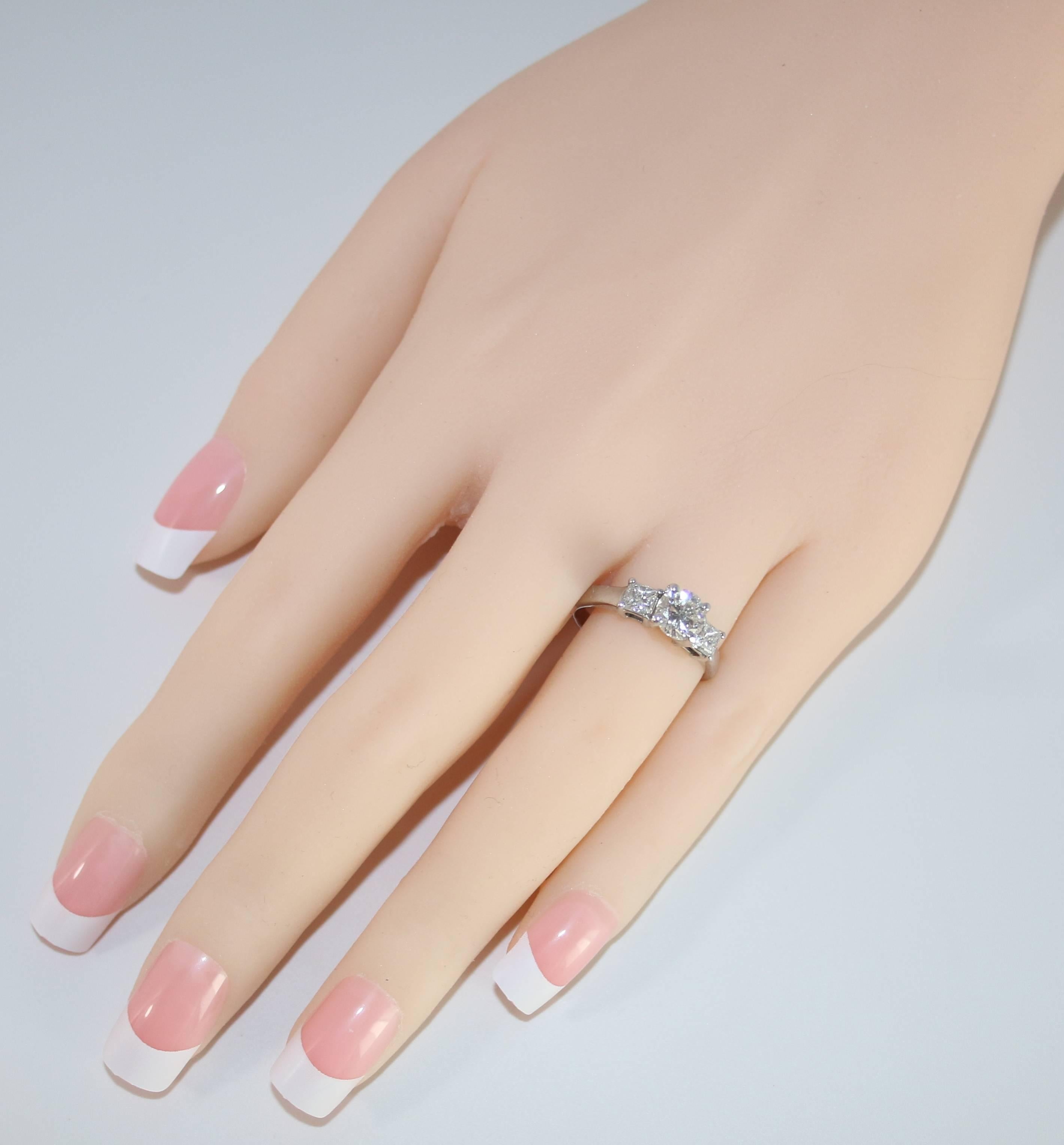 Contemporary GIA Certified 0.90 Carat H VS2 Diamond Three Stone Platinum Ring For Sale