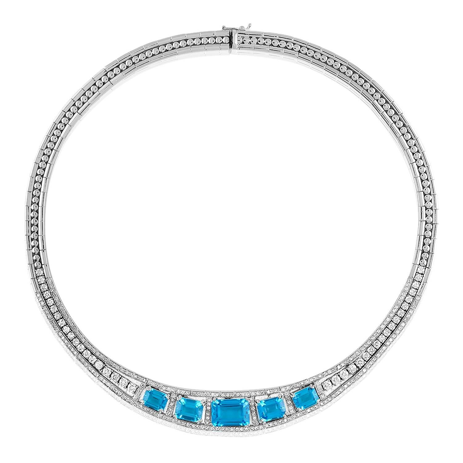Stunning 3-Piece Set
The set consists of 1 Bracelet, 1 Necklace, & 1 Pair of Earrings

The necklace is 18K White Gold
There are 5.32 Carats in Diamonds G SI
There are 24.67 Carats in Blue Topaz
The necklace is 16